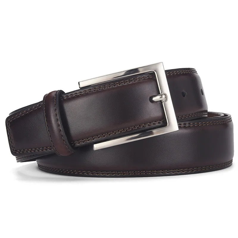 Men's black genuine leather belt with silver alloy pin buckle on a flat surface