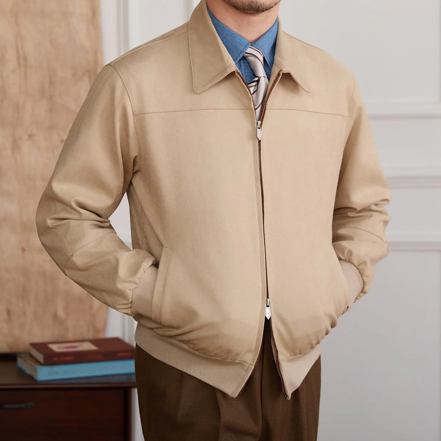 Men's suede bomber jacket with turn-down collar and zip front in apricot colour, long sleeves