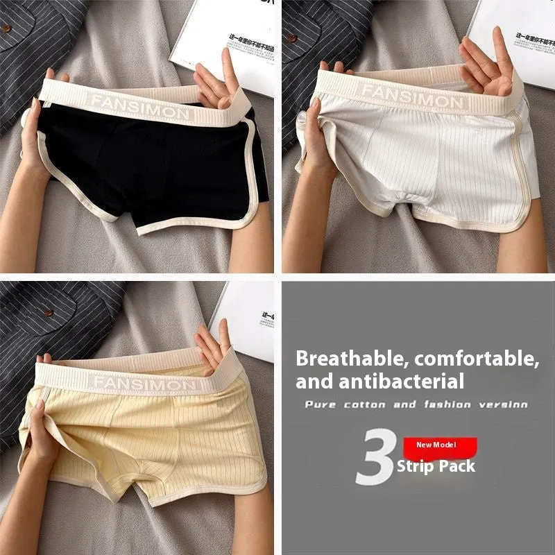 Three-pack of men's milk silk polyester boxer shorts in solid colours on a white background