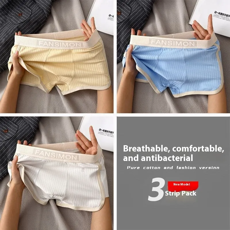 Three-pack of men's milk silk polyester boxer shorts in solid colours on a white background