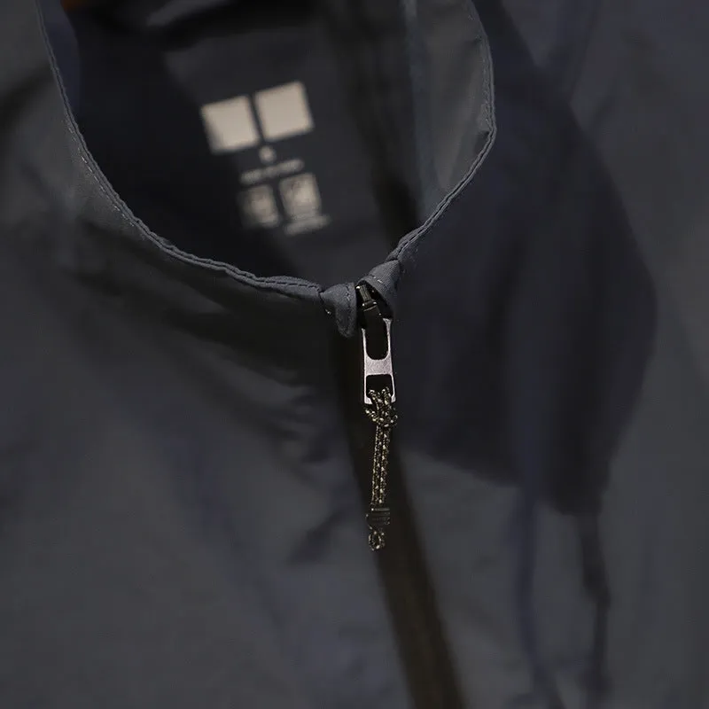 Men's thin nylon bandage-style vest in army green with side seam pockets on a hanger.