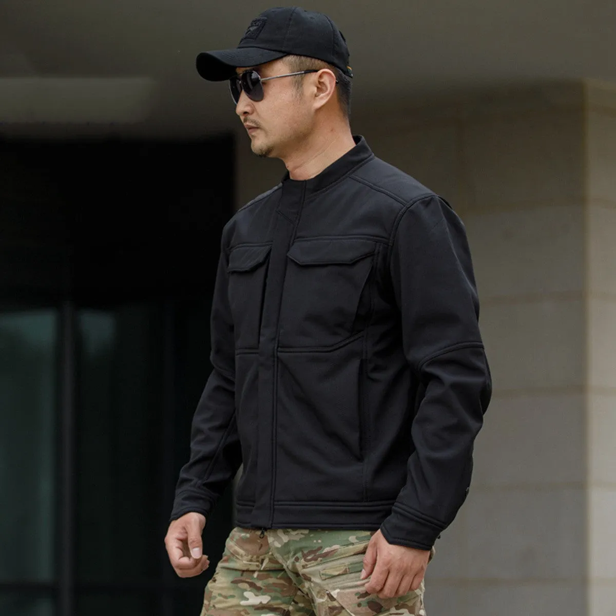 Bone Frog Peak Breaker soft shell tactical jacket in black camouflage colour for mountaineering.