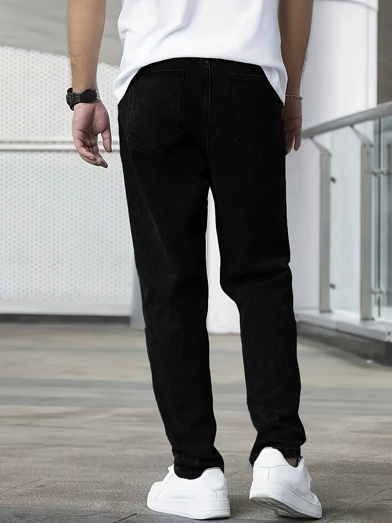Men's black straight-leg cotton jeans mid-rise zip fly casual trousers front view