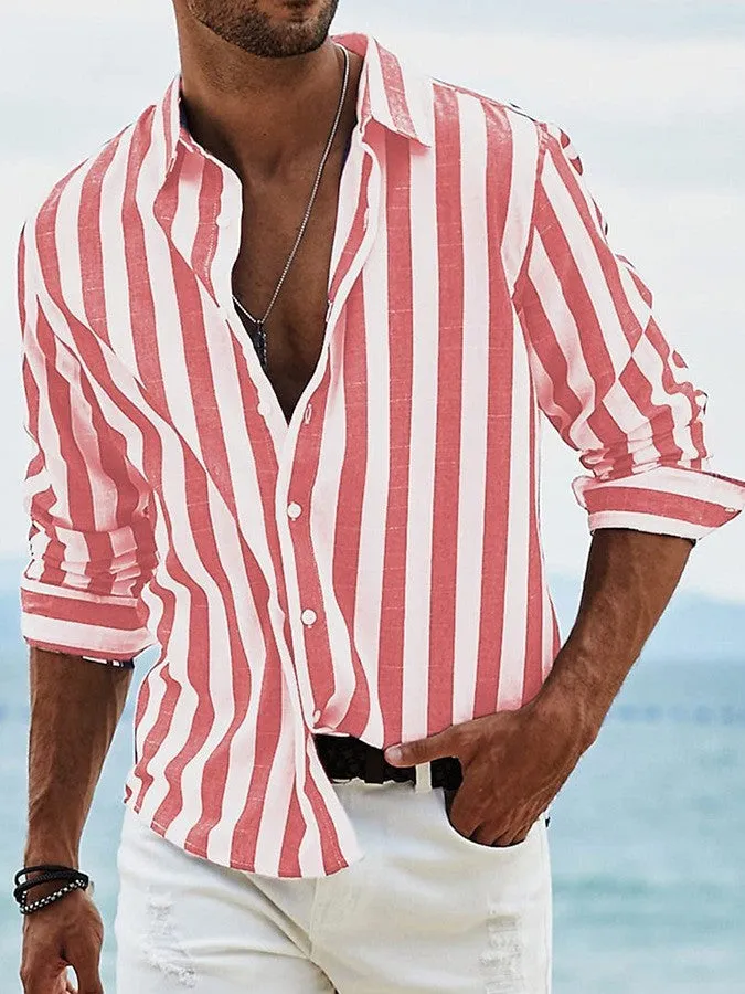 Man wearing a loose grey striped casual long-sleeved shirt with a cardigan style.