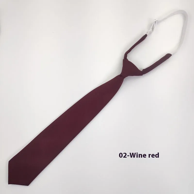 Men's solid navy blue cotton bow tie showing arrow-type design and dimensions
