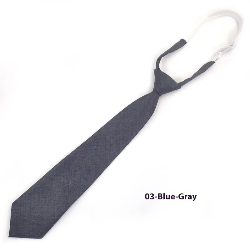 Men's solid navy blue cotton bow tie showing arrow-type design and dimensions