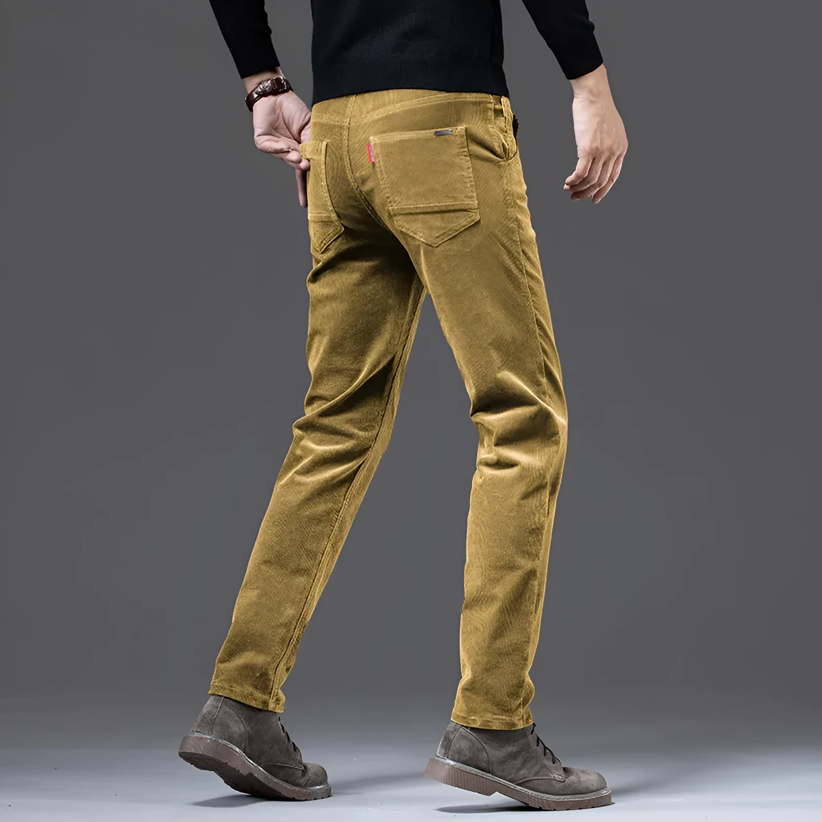 Straight slim-fit cotton corduroy trousers in brown, shown from front