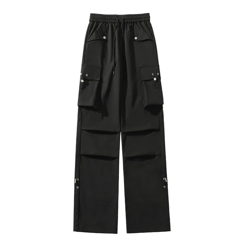 Waterproof loose-fit straight-leg trousers in black, available in plus sizes.
