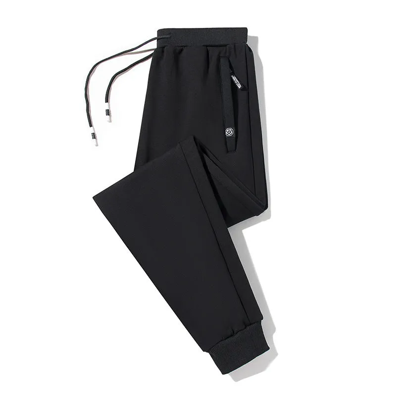 Plum Label men's large size cotton drawstring sweatpants in flat black, loose closed leg style