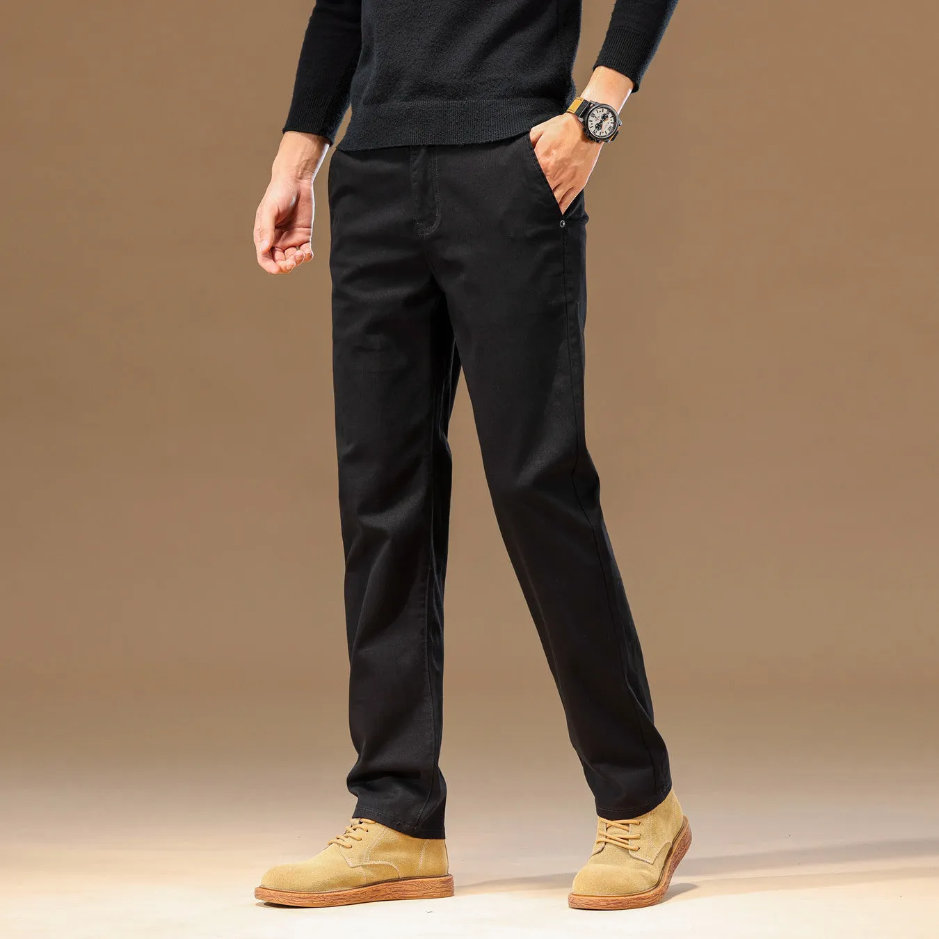 Men's cotton denim loose straight casual trousers in rust red with zip fly and elastic waist, front view