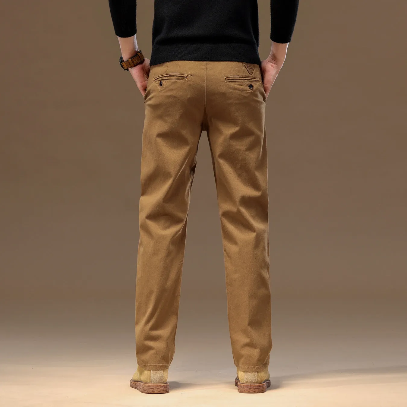 Men's cotton denim loose straight casual trousers in rust red with zip fly and elastic waist, front view