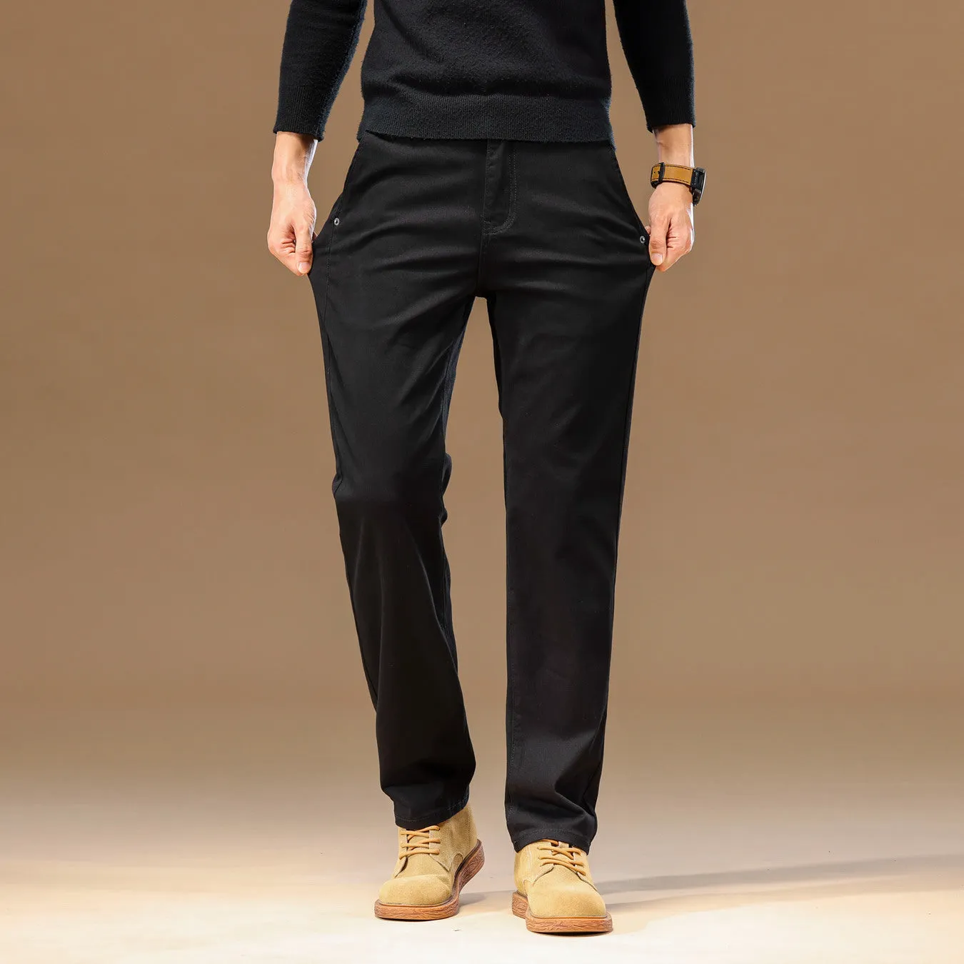 Men's cotton denim loose straight casual trousers in rust red with zip fly and elastic waist, front view