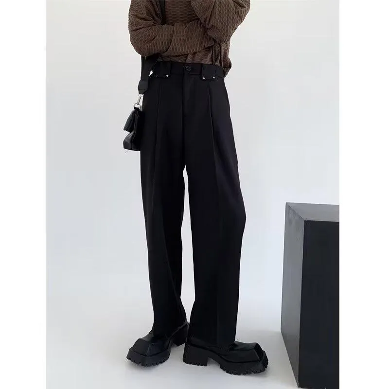 Women's black high-waisted cropped suit pants with draping effect, sizes M-3XL, on display