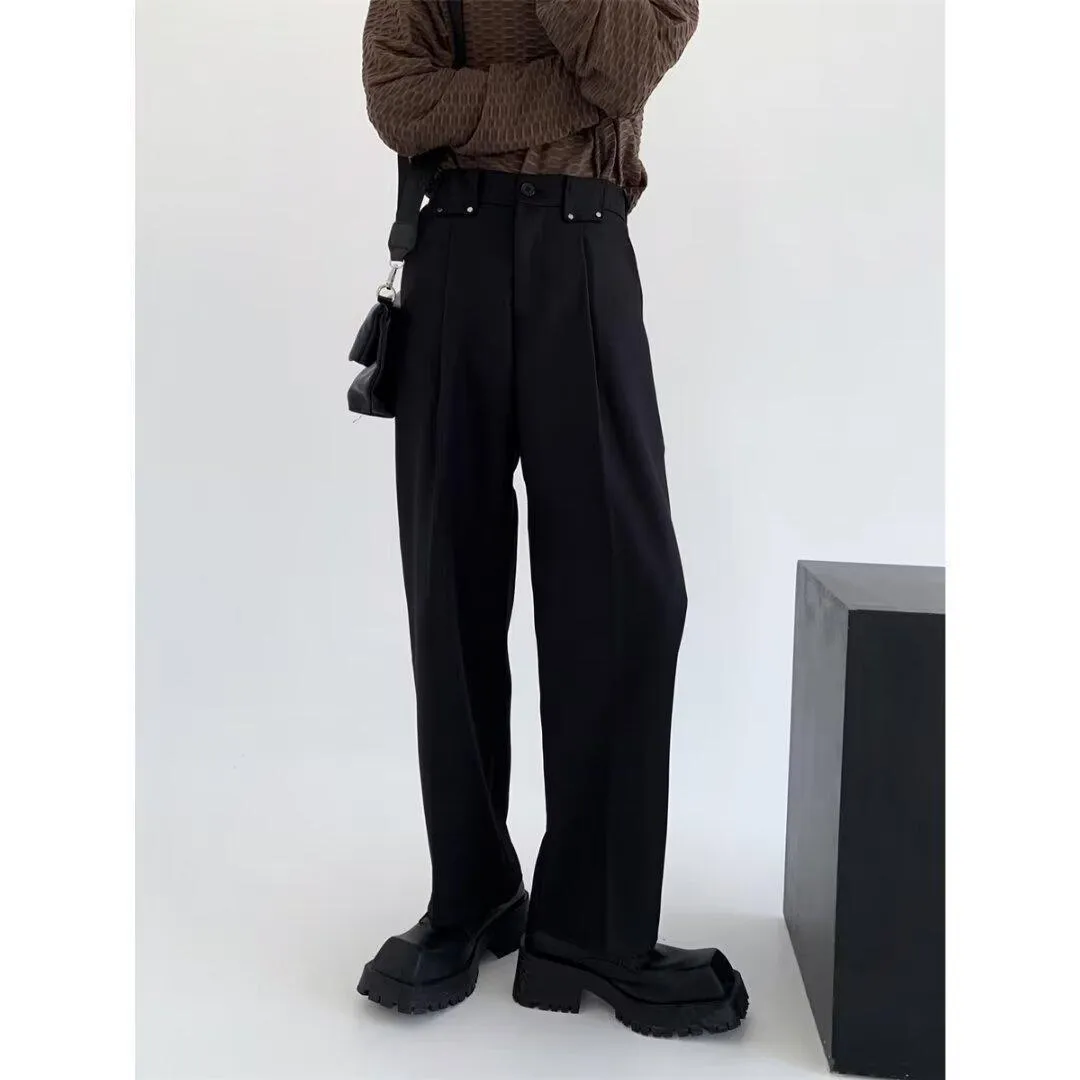 Women's black high-waisted cropped suit pants with draping effect, sizes M-3XL, on display