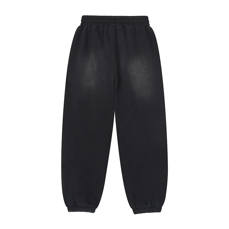 Black men's loose cotton sports sweatpants with wool lining, straight leg style