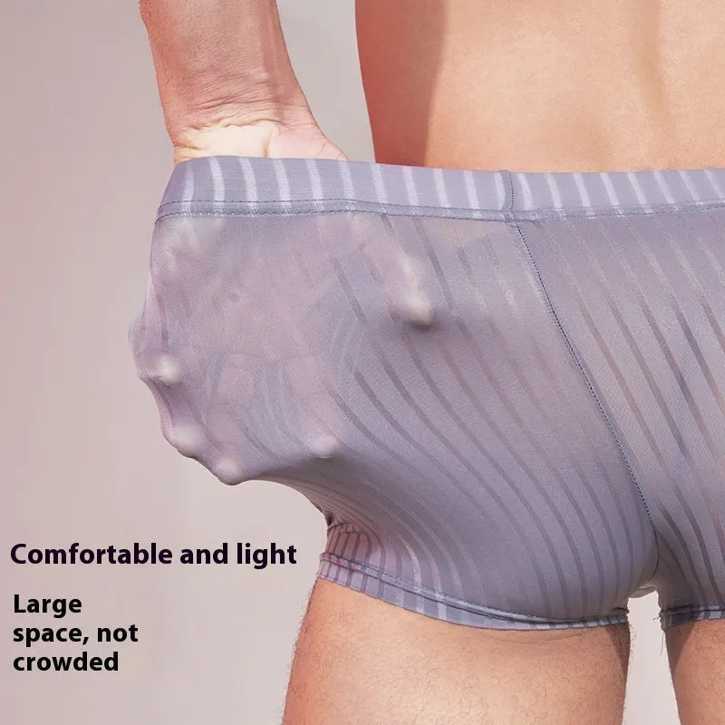 Men's thin striped nylon underwear in black, white, and dark grey on a white background.
