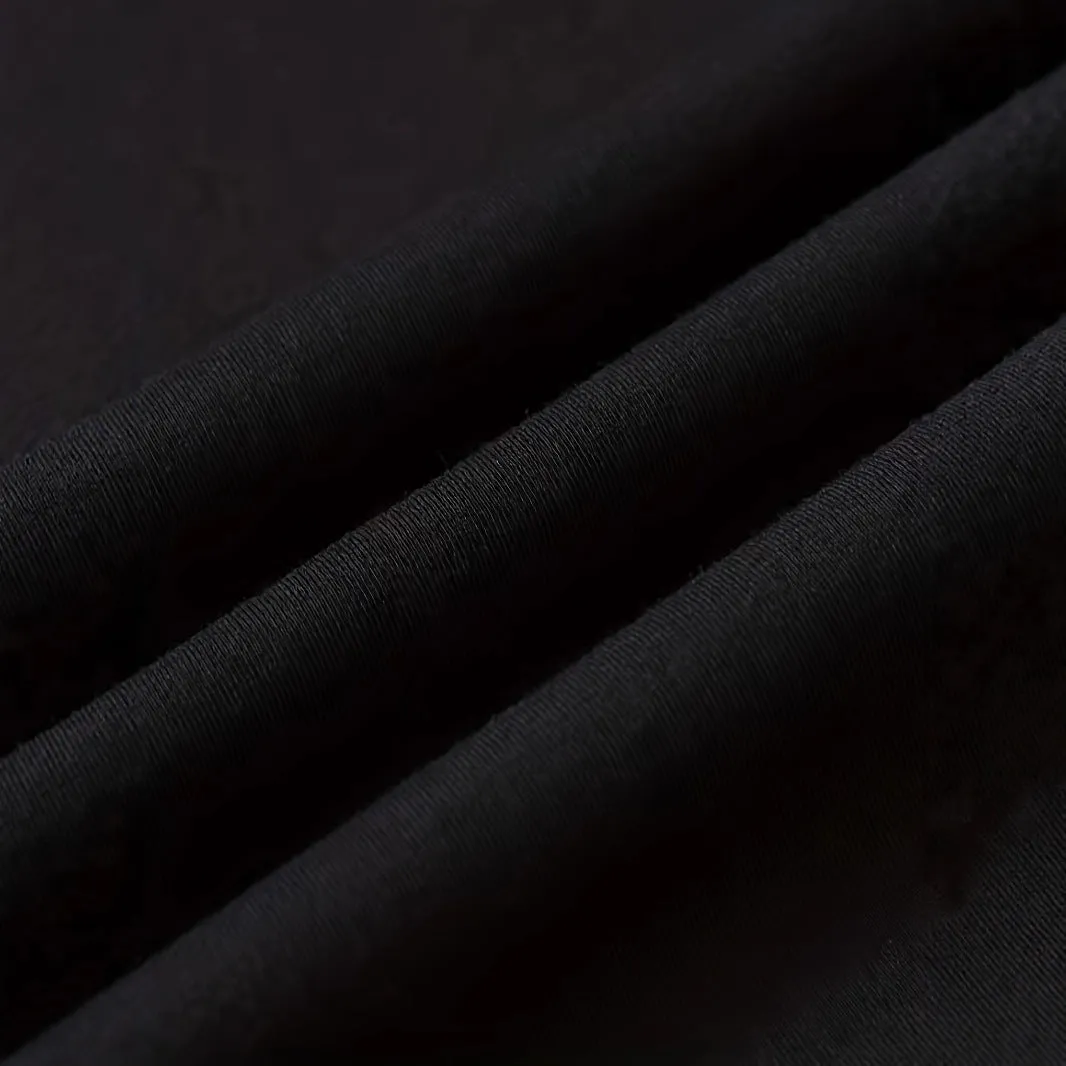Men's short-sleeved loose fit cotton T-shirt in black pullover style on model
