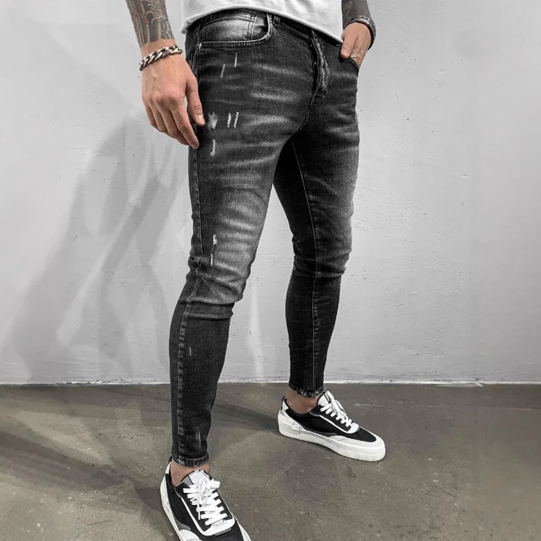 Gray ripped denim skinny pants for teenagers, cotton fabric, mid waist, zip fly, front view
