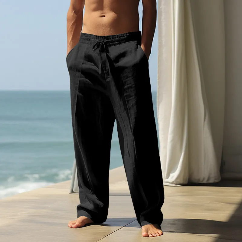 Men's loose fit casual cotton trousers in a solid colour, shown in one of seven available colours.