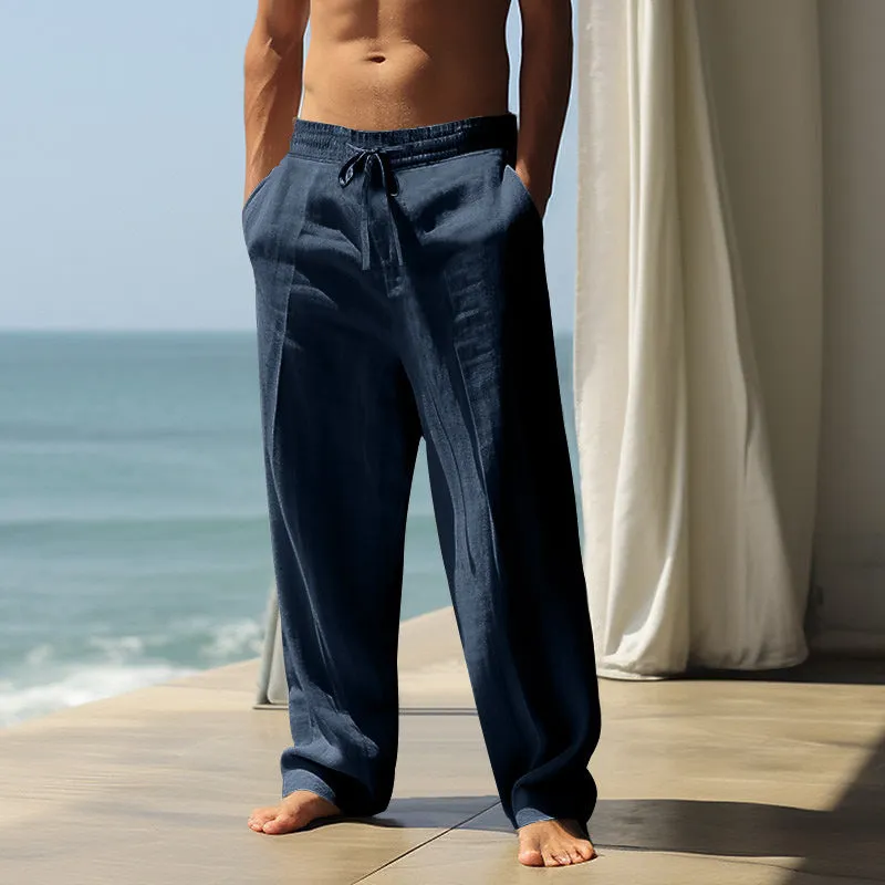 Men's loose fit casual cotton trousers in a solid colour, shown in one of seven available colours.