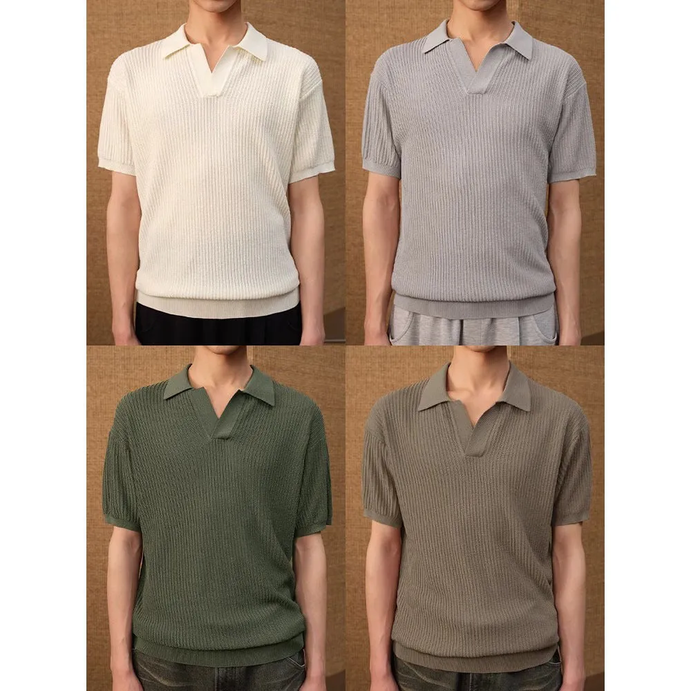 Men's creamy white polo shirt with short sleeves and a loose fit on a hanger.