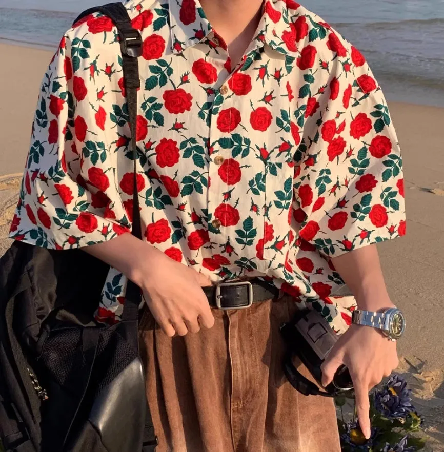 Summer Port retro rose-printed short-sleeved shirt in apricot colour on a model
