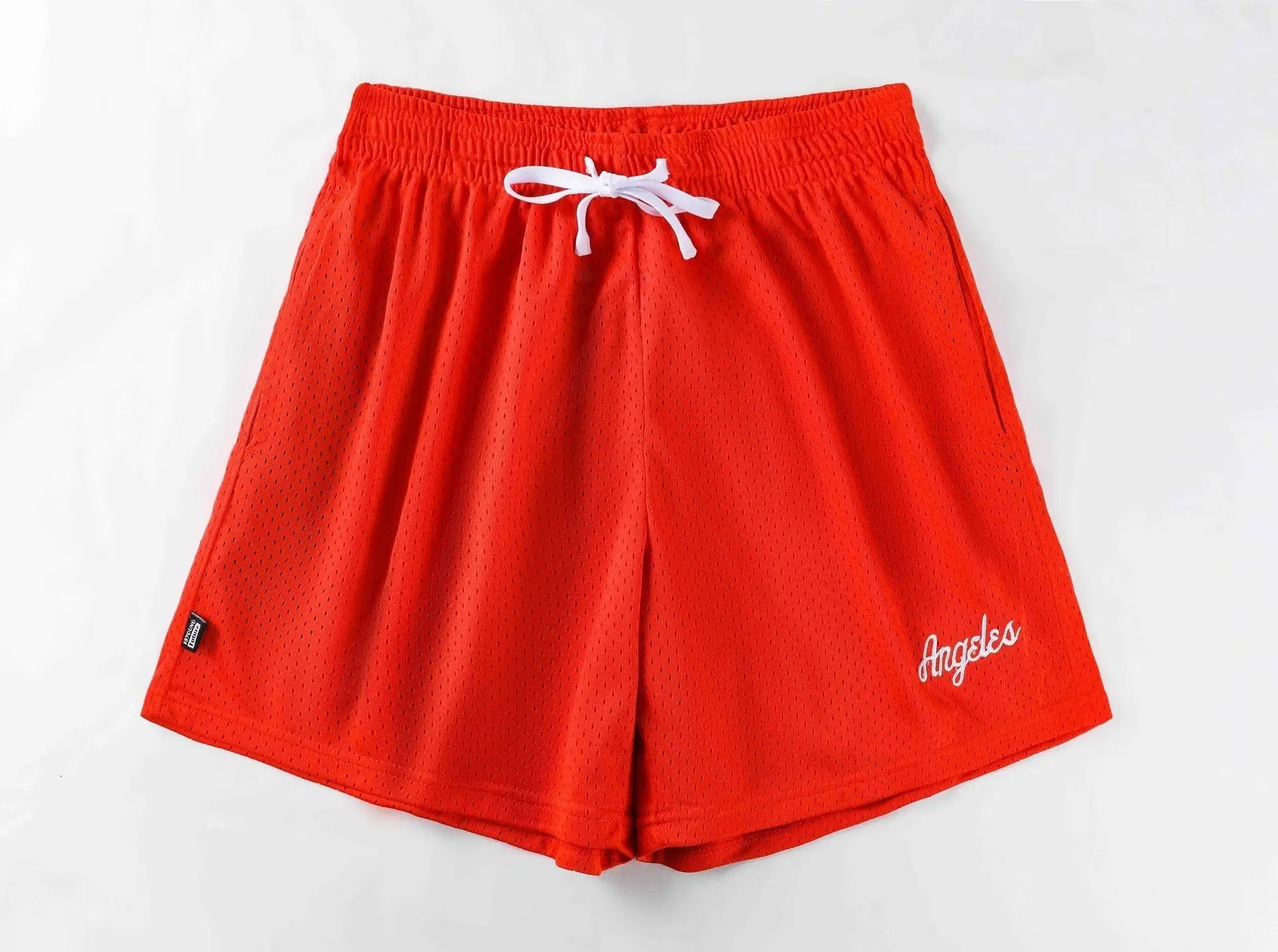 Men's black double-layer mesh sports shorts on a manikin, showing the textured design.