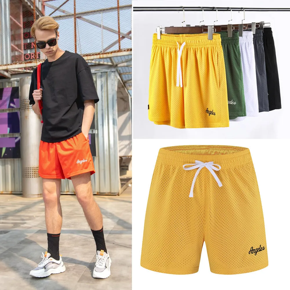 Men's black double-layer mesh sports shorts on a manikin, showing the textured design.