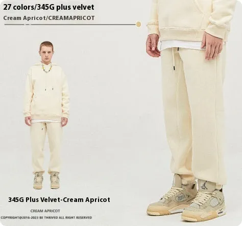 Men's solid colour cotton velvet sweatpants with elastic waist and ankle banding detail