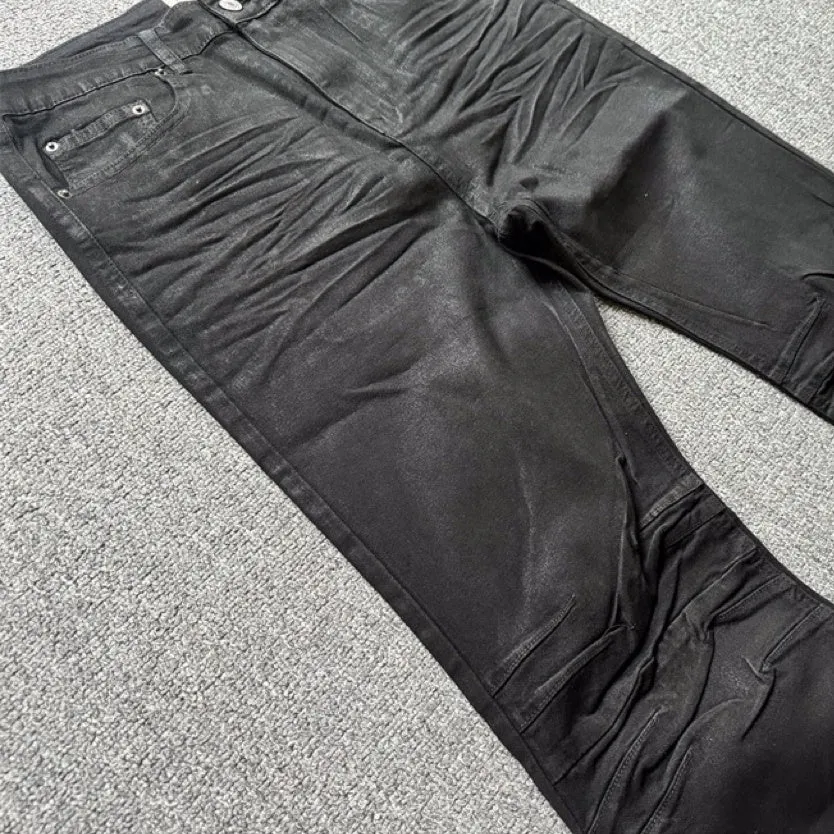 Retro black wax coating washed loose fit men's jeans with mid waist and zip fly