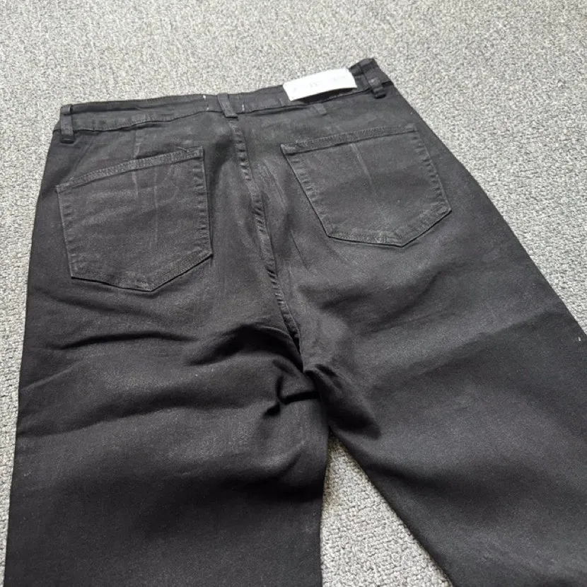 Retro black wax coating washed loose fit men's jeans with mid waist and zip fly