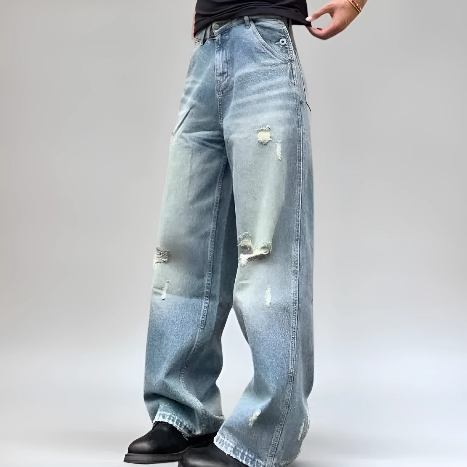 Water washed hole jeans in retro blue with loose straight leg and zip fly for women