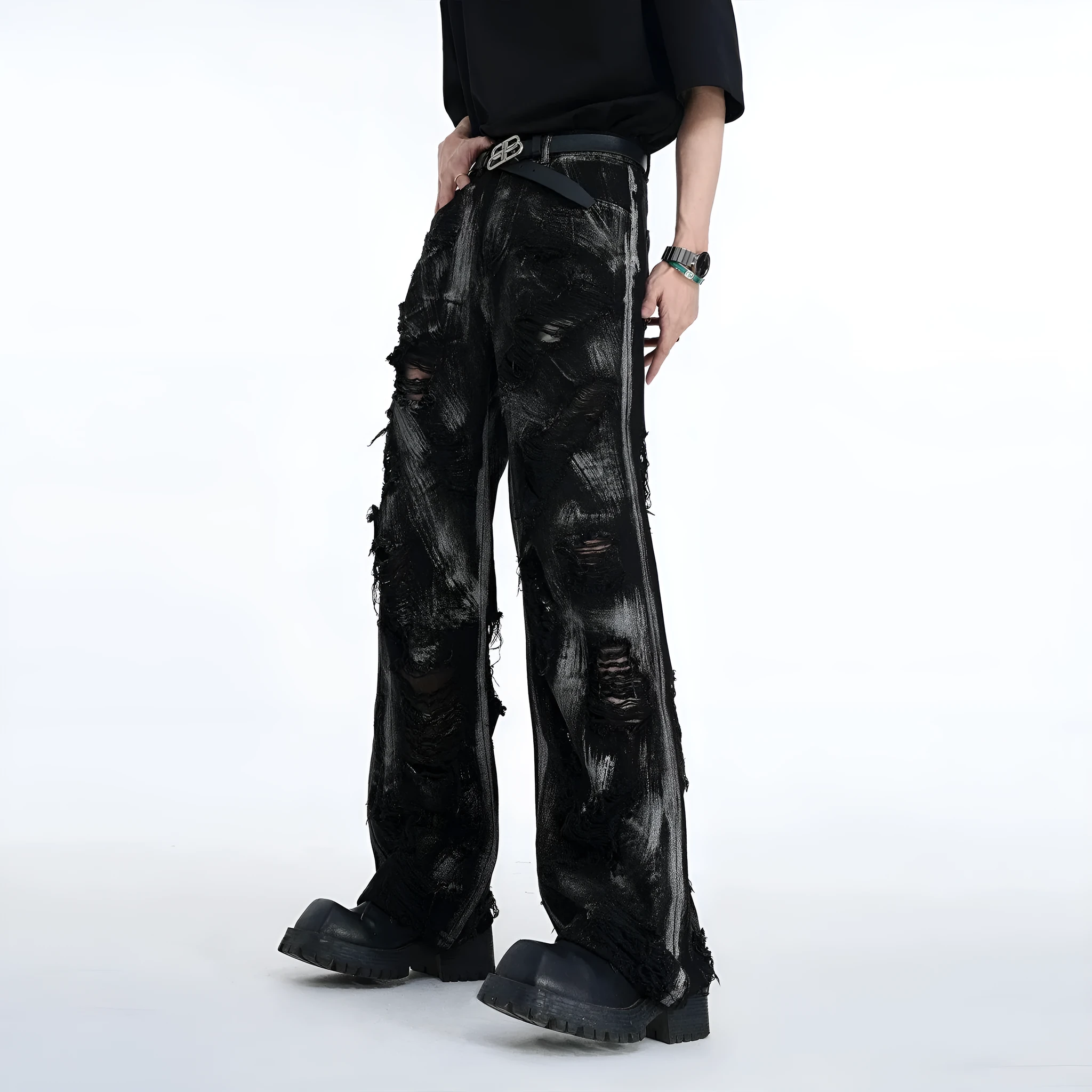 Men's grey pink graffiti detail denim trousers laid flat, showing mid-waist and zipper fly.