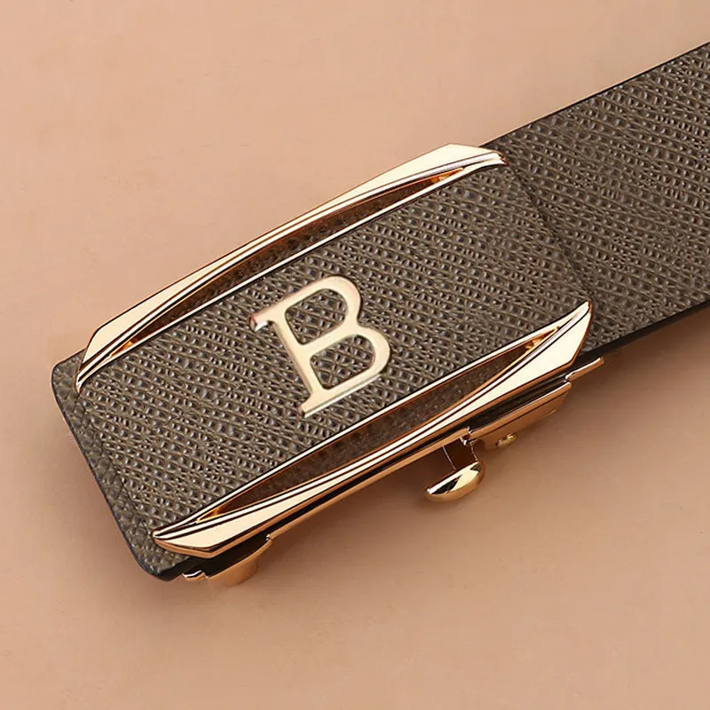 Genuine leather automatic buckle belt with alloy buckle, black gold finish, on display