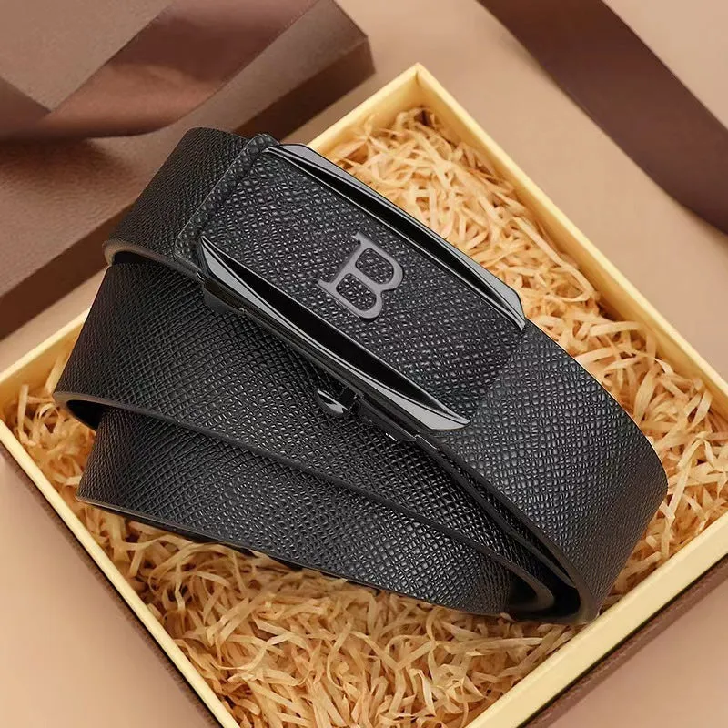 Genuine leather automatic buckle belt with alloy buckle, black gold finish, on display