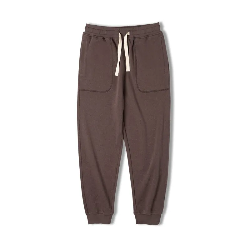 Retro men's tapered ankle-tied sweatpants in dark gray with drawstring elastic waist