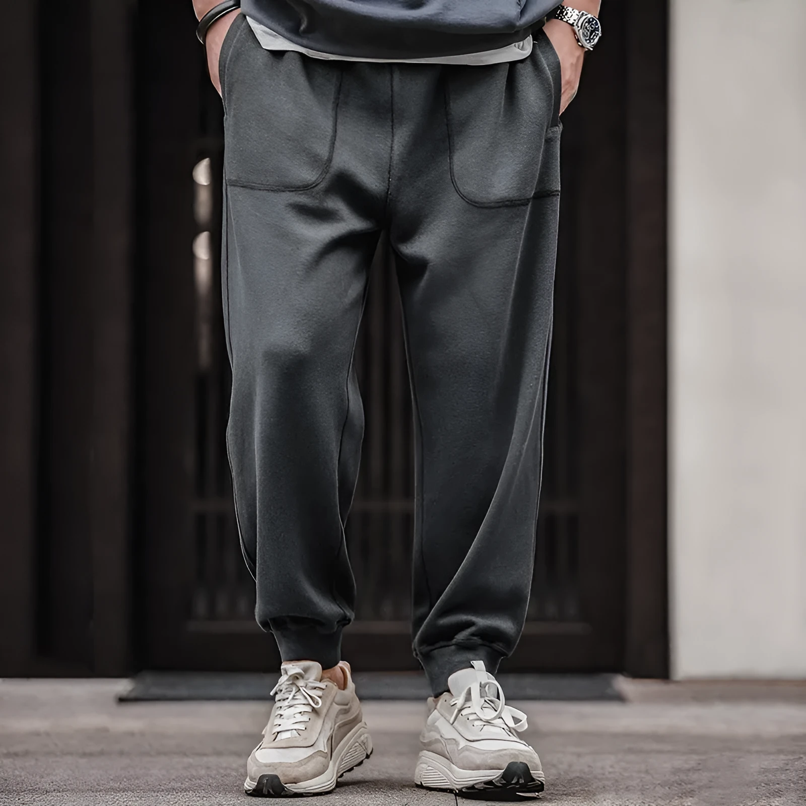 Retro men's tapered ankle-tied sweatpants in dark gray with drawstring elastic waist
