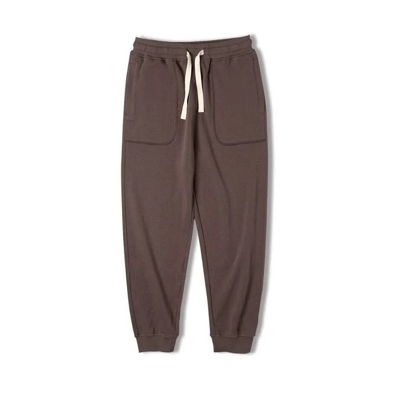 Retro men's tapered ankle-tied sweatpants in dark gray with drawstring elastic waist