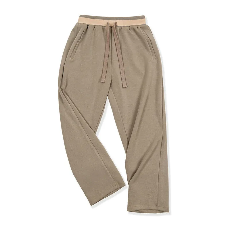 Casual loose-fit anti-wrinkle polyester sweatpants for men in dark blue, grey, or light brown