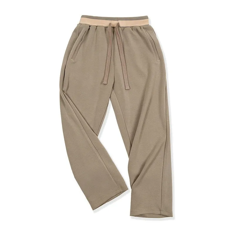 Casual loose-fit anti-wrinkle polyester sweatpants for men in dark blue, grey, or light brown