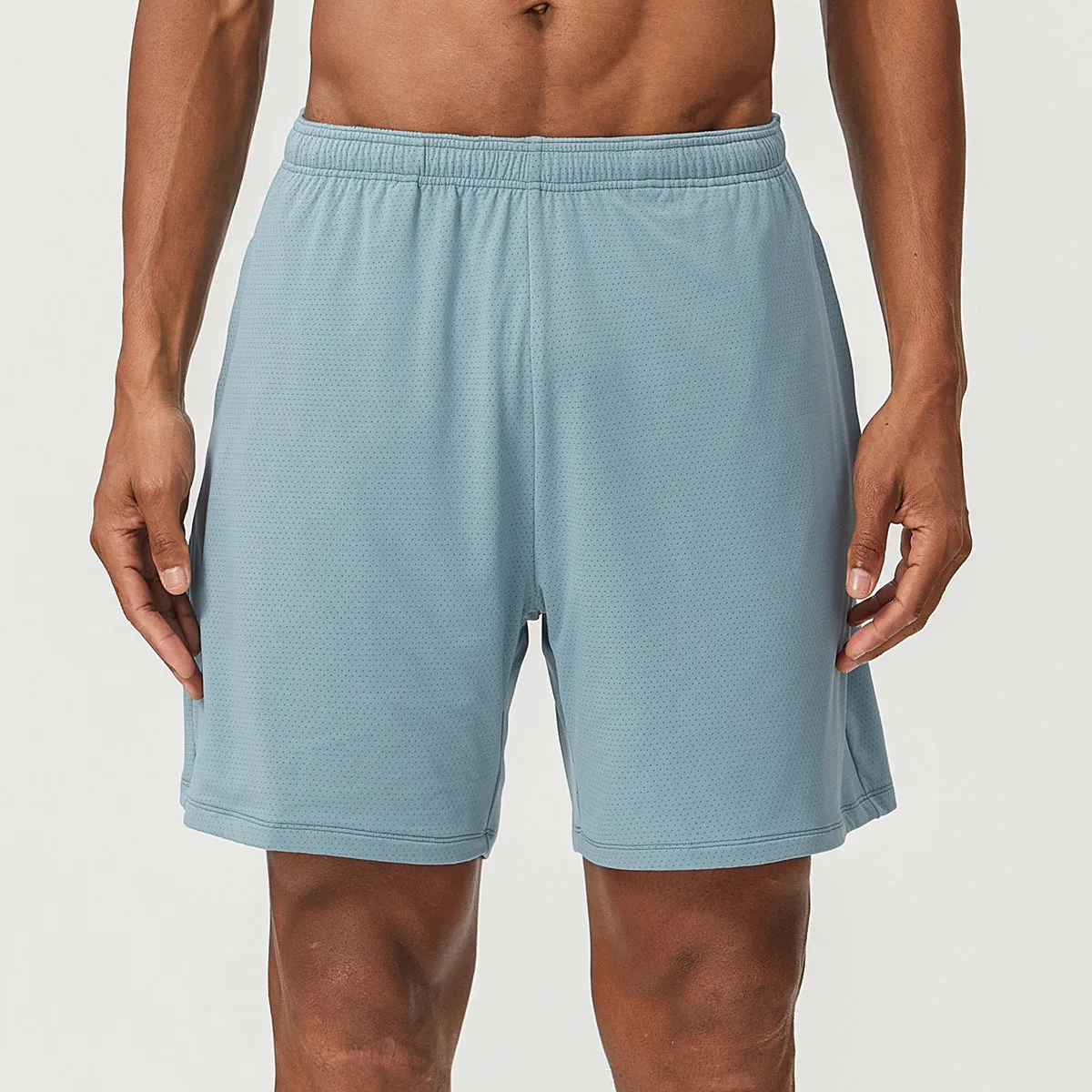 Men's sky green quick-dry running shorts with mid-waist and double-layer construction.
