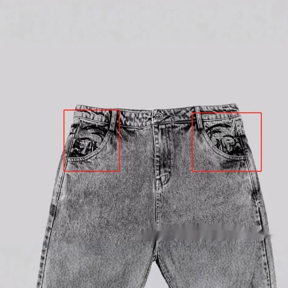 Grey loose straight-leg denim trousers for men and women laid flat, showing mid waist and classic cut.