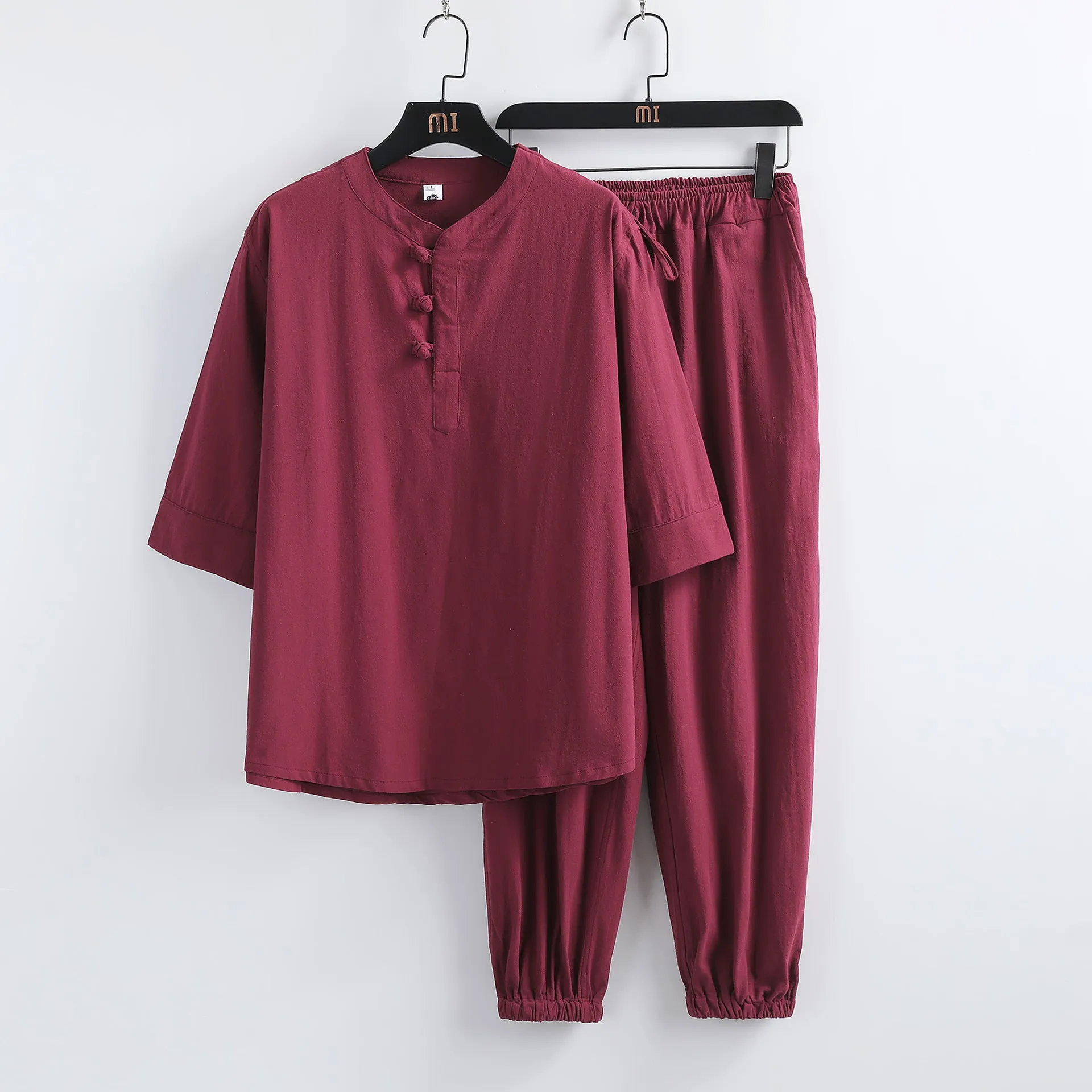 Linen short sleeve suit set for men with buckle top and trousers in summer Chinese style