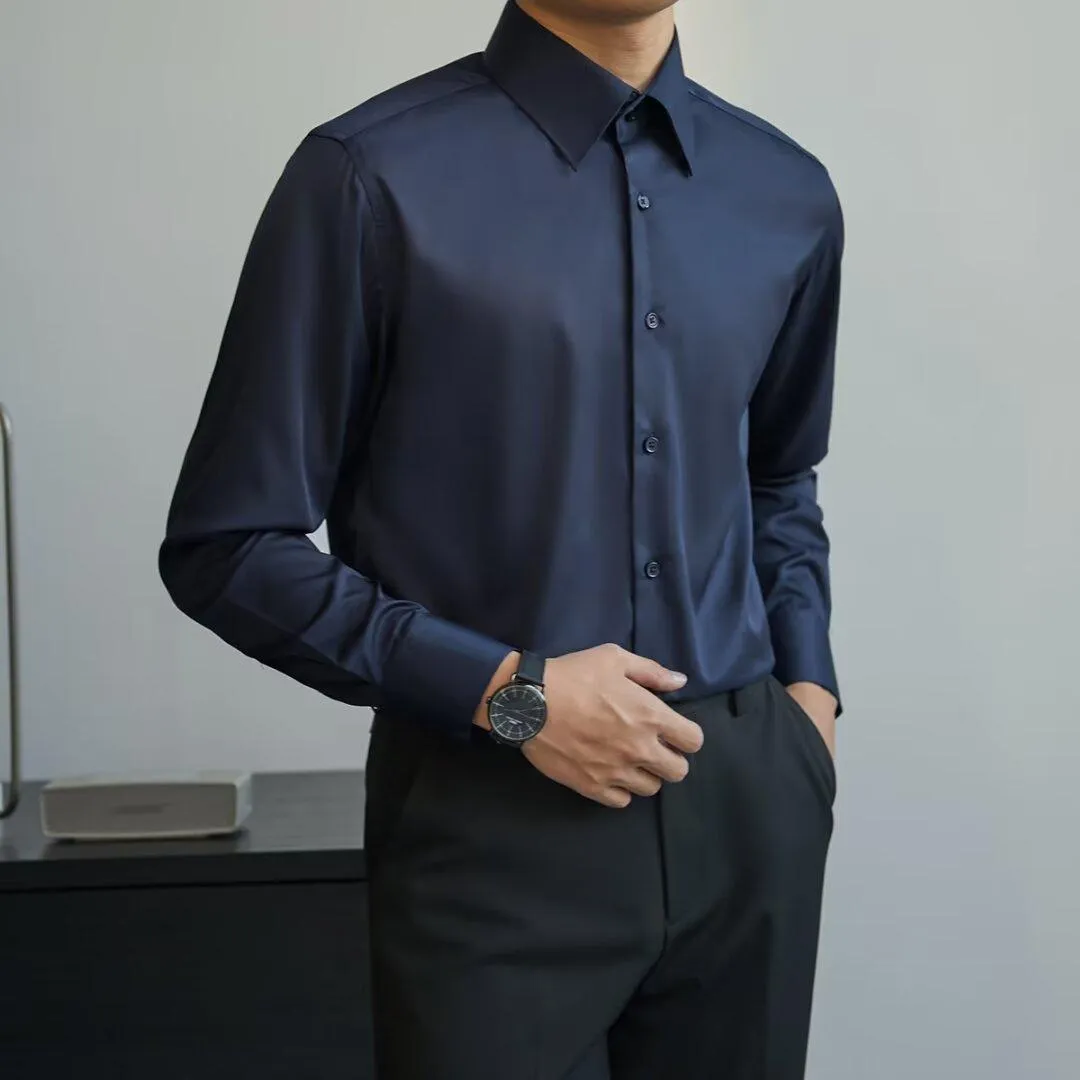 Man wearing a black Japanese retro style loose fit cardigan shirt with long sleeves.