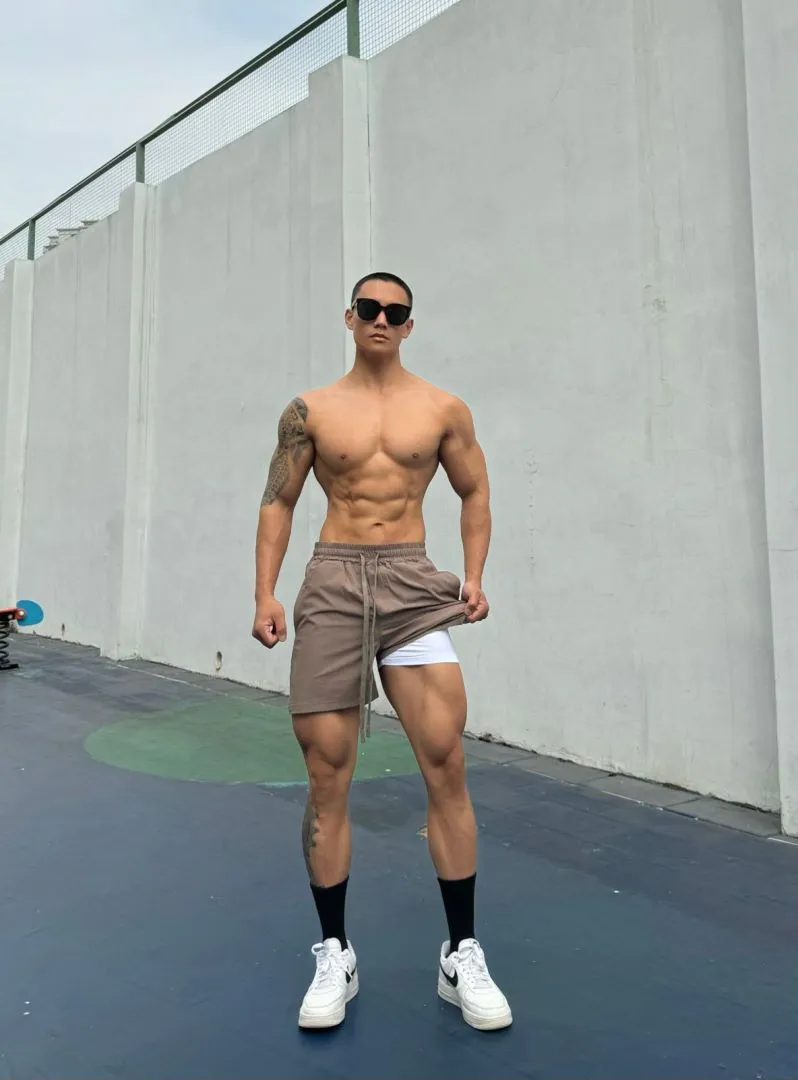 Men's Ice Silk quick-dry double-layer casual shorts in nylon fabric.