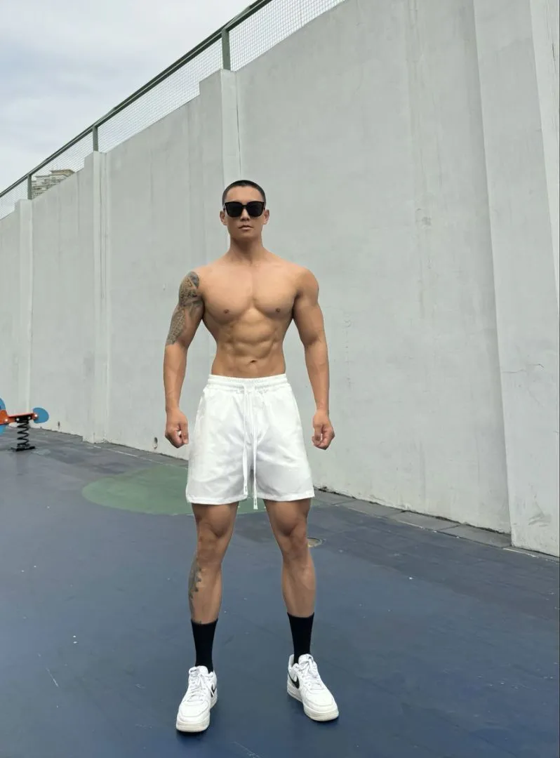 Men's Ice Silk quick-dry double-layer casual shorts in nylon fabric.