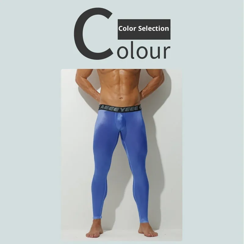 Men's ultra-thin thermal pants in black with low waist slim fit stretch nylon spandex fabric
