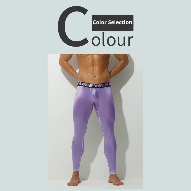 Men's ultra-thin thermal pants in black with low waist slim fit stretch nylon spandex fabric