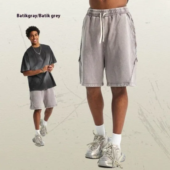 Men's batik washed cotton terry shorts in loose street fashion style showing colour variations