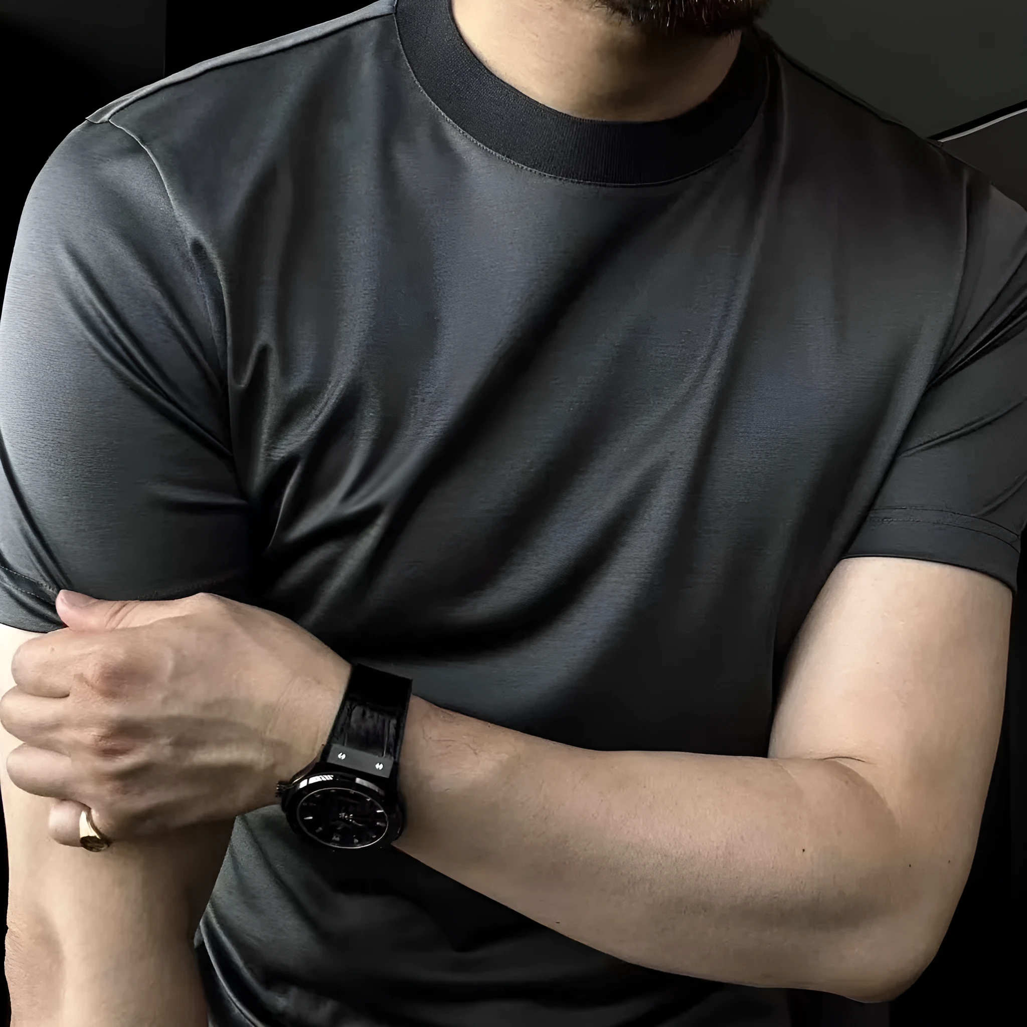 Ice silk soft breathable round neck short sleeve T-shirt in black front view on model